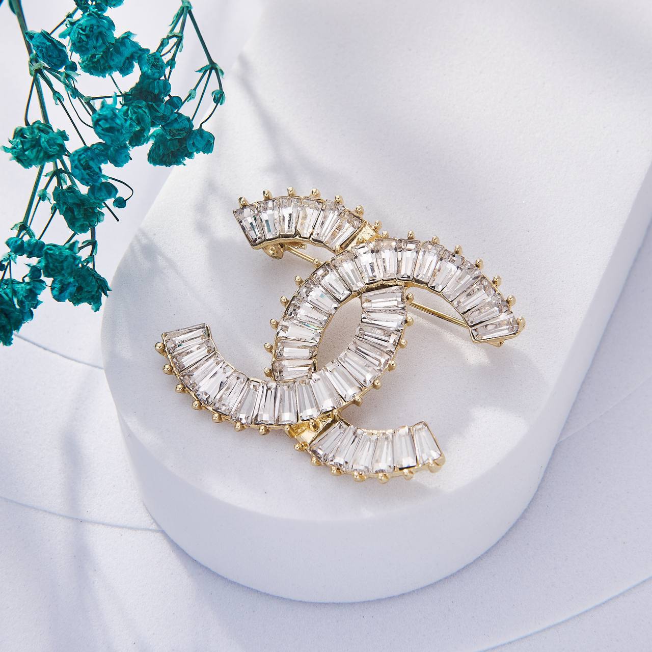 Une Selection de luxe de Broche Chanel Inoxydable