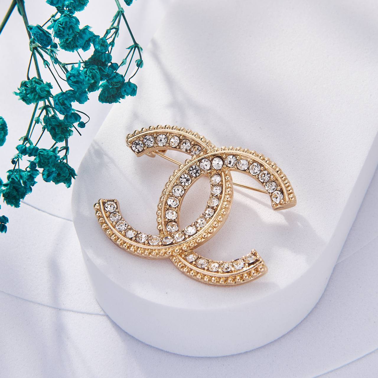 Une Selection de luxe de Broche Chanel Inoxydable