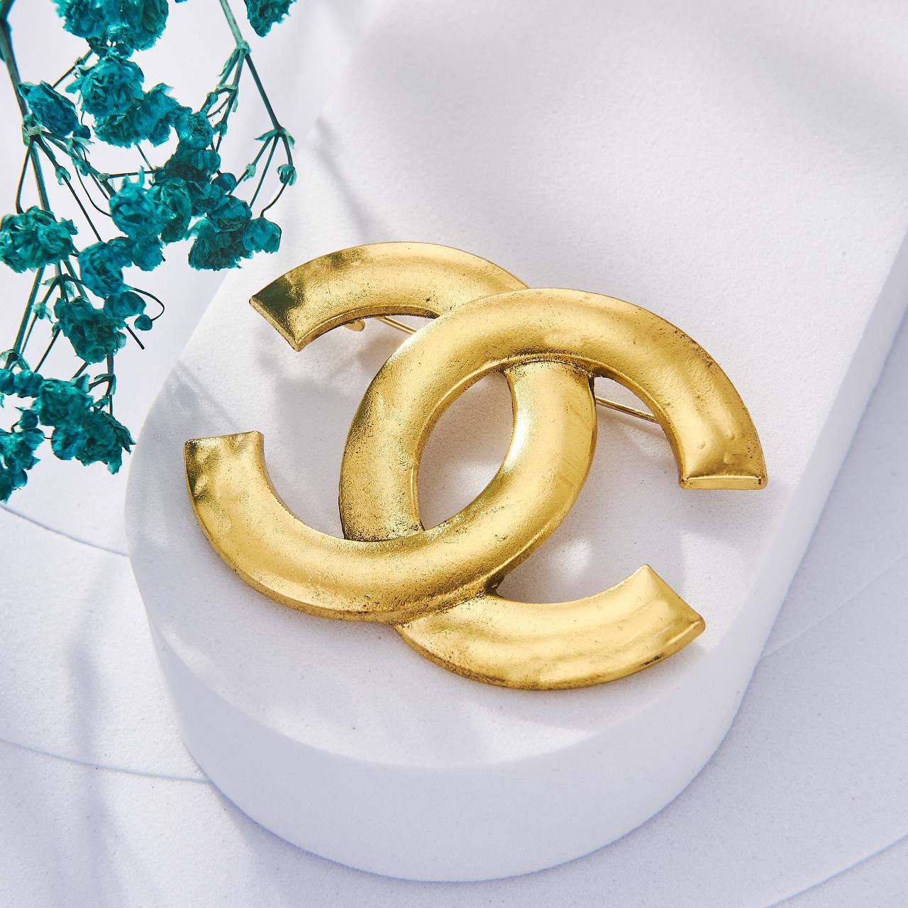 Une Selection de luxe de Broche Chanel Inoxydable