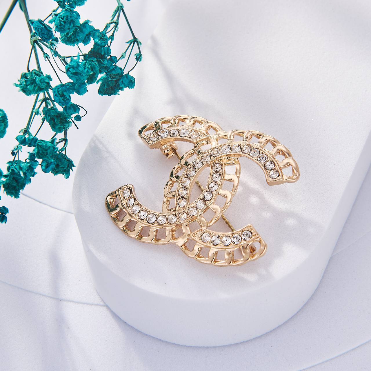 Une Selection de luxe de Broche Chanel Inoxydable