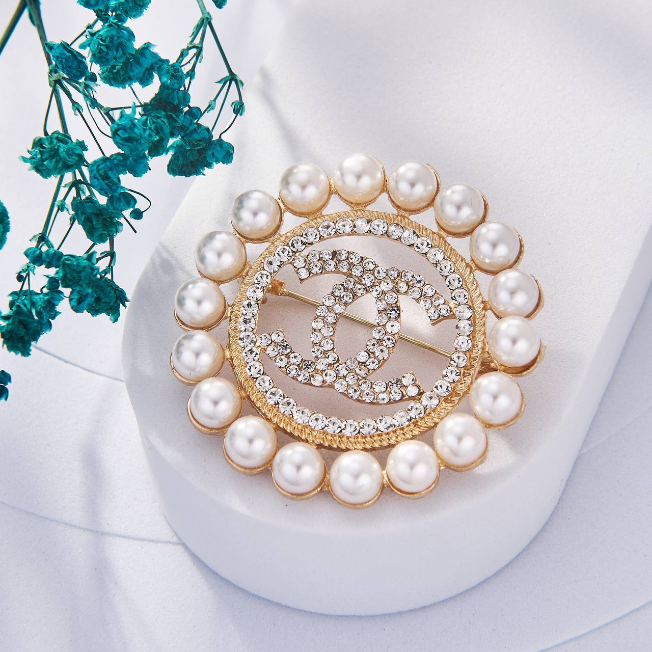 Une Selection de luxe de Broche Chanel Inoxydable