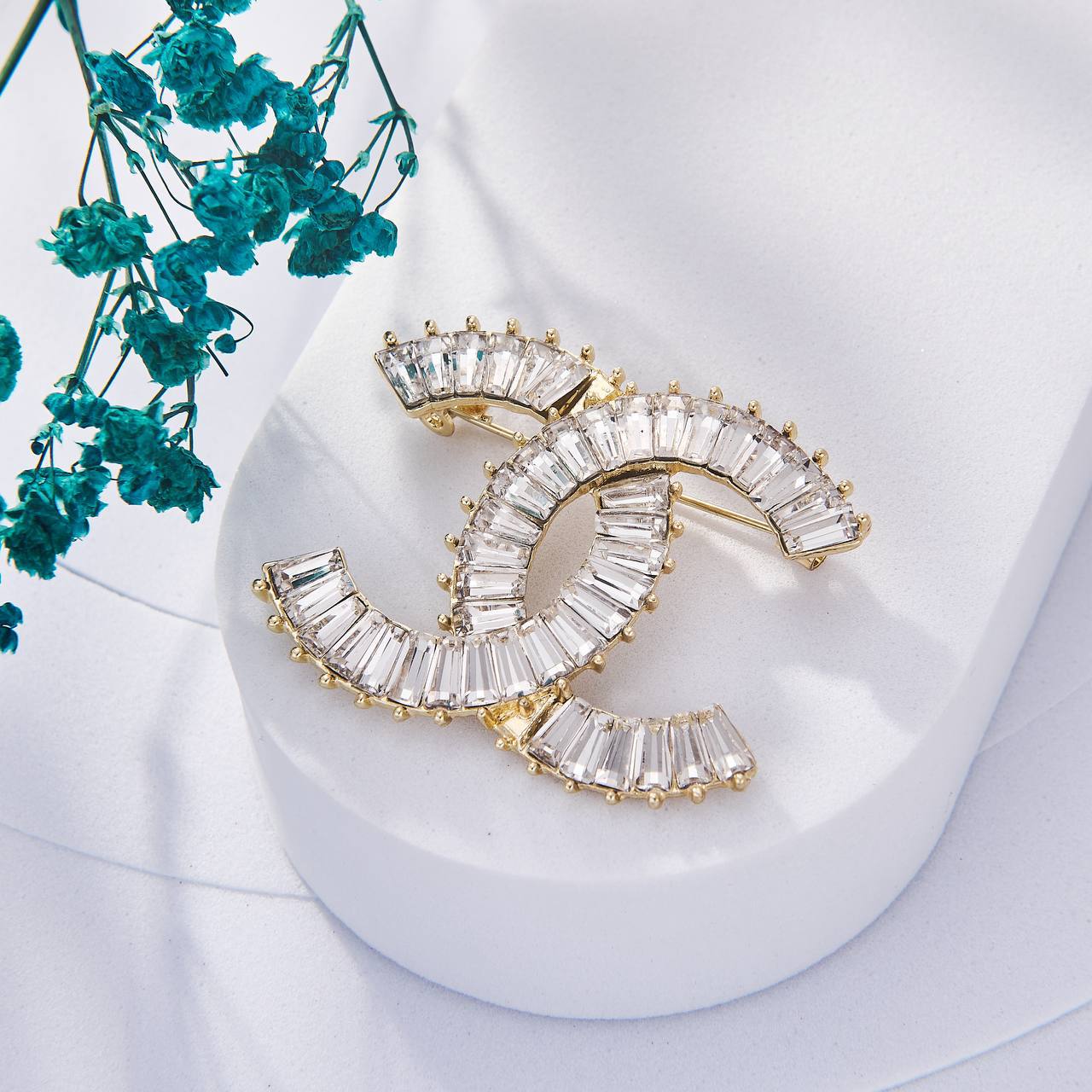 Une Selection de luxe de Broche Chanel Inoxydable