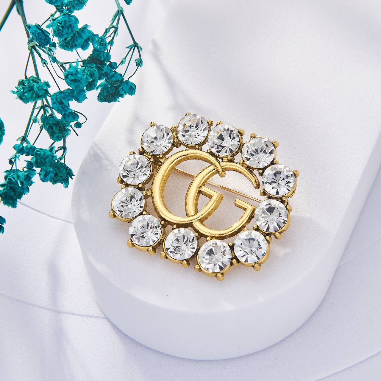 Broche Gucci Inoxydable
