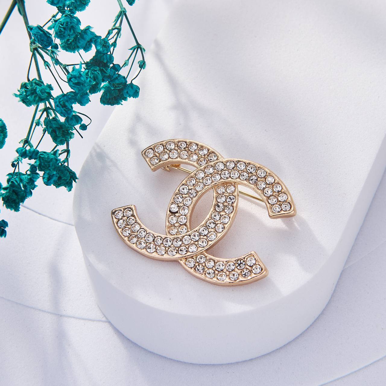 Une Selection de luxe de Broche Chanel Inoxydable