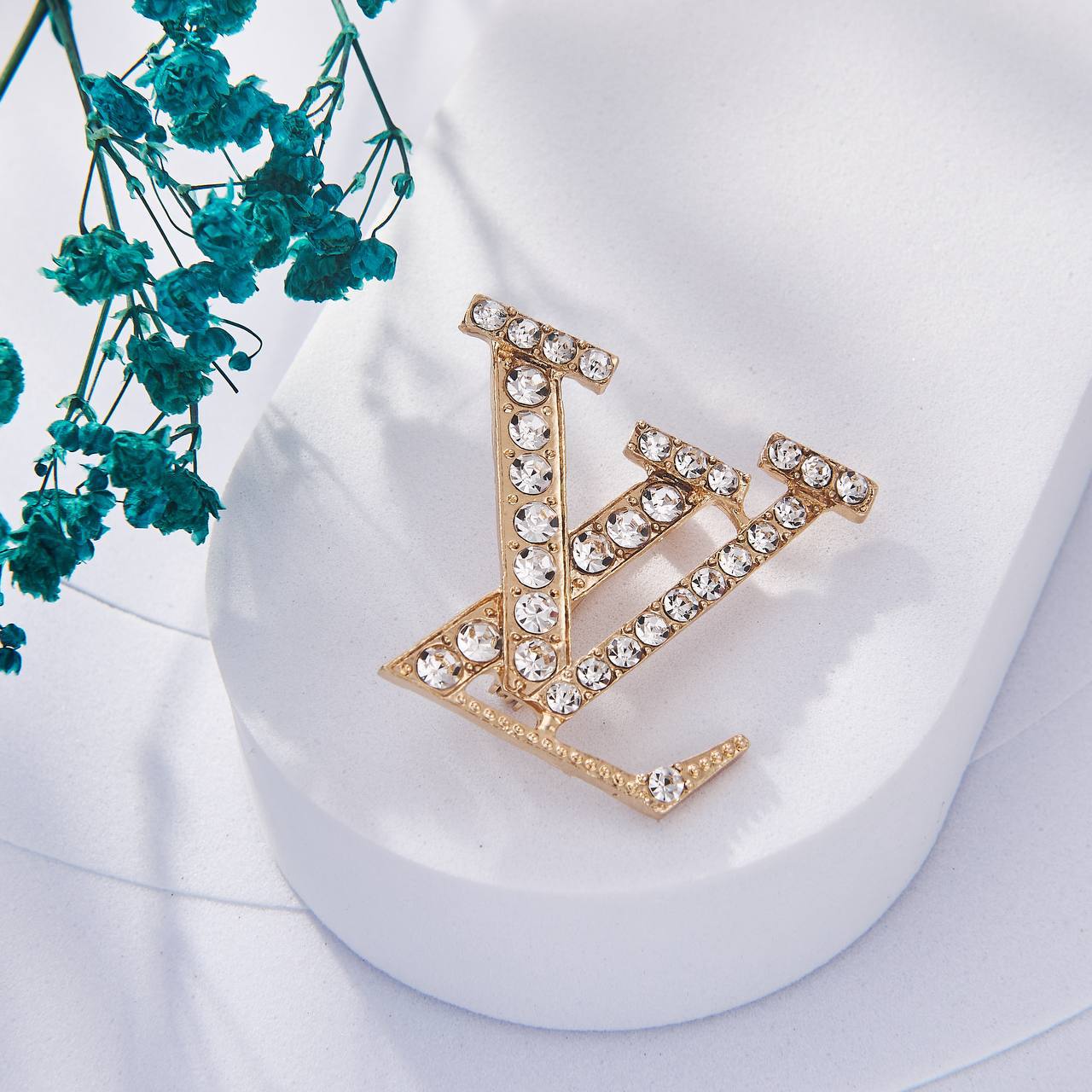 Broche Louis Vuitton Inoxydable