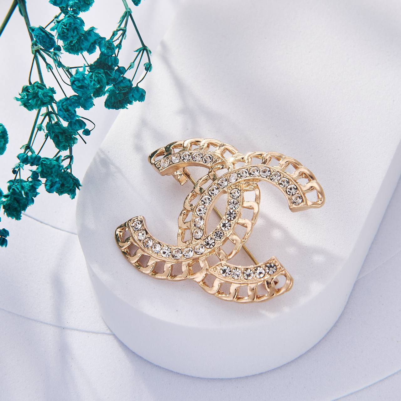Une Selection de luxe de Broche Chanel Inoxydable