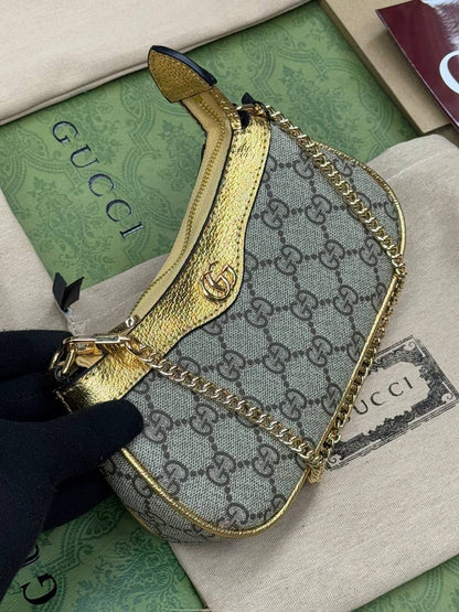 Sac Gucci à détail Doré