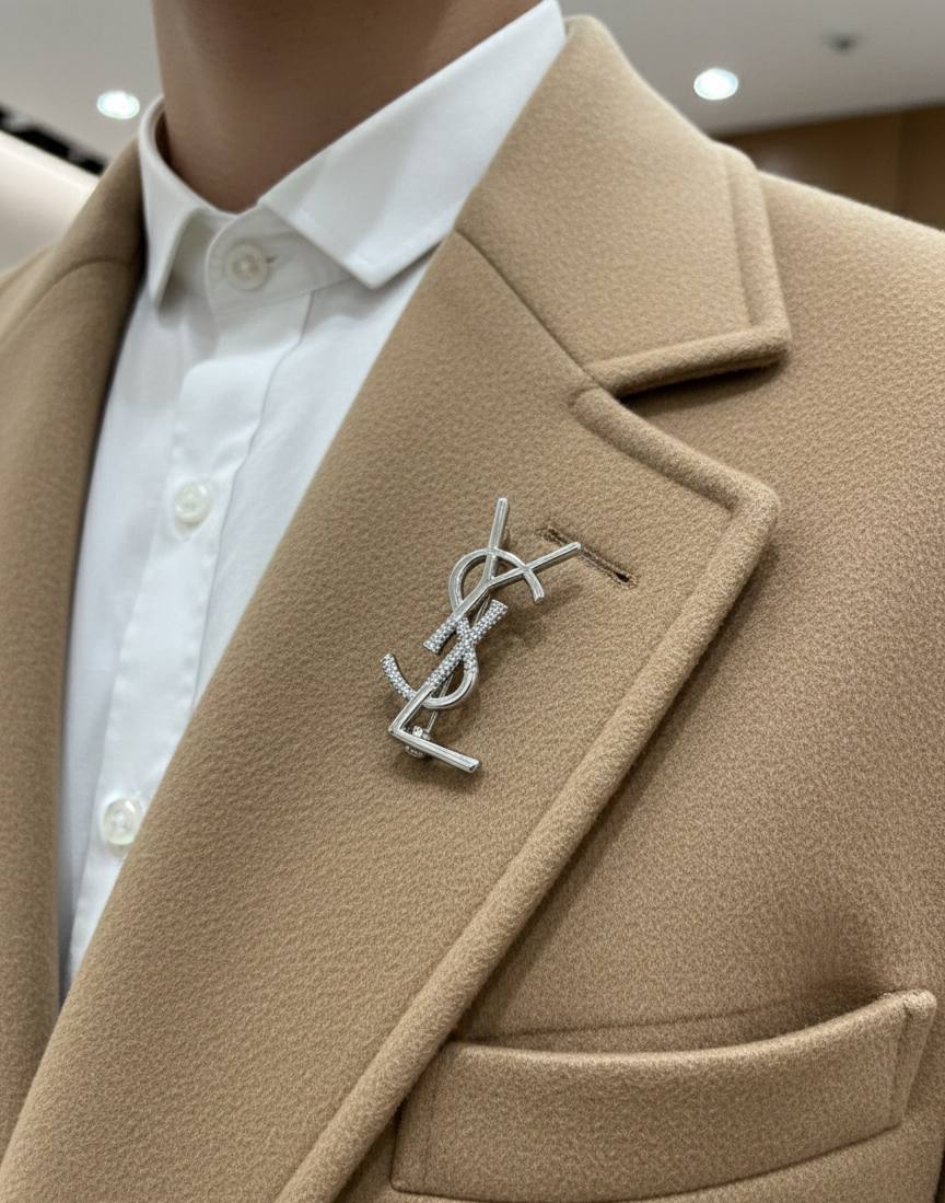 Broche Yves Saint Laurent Inoxydable