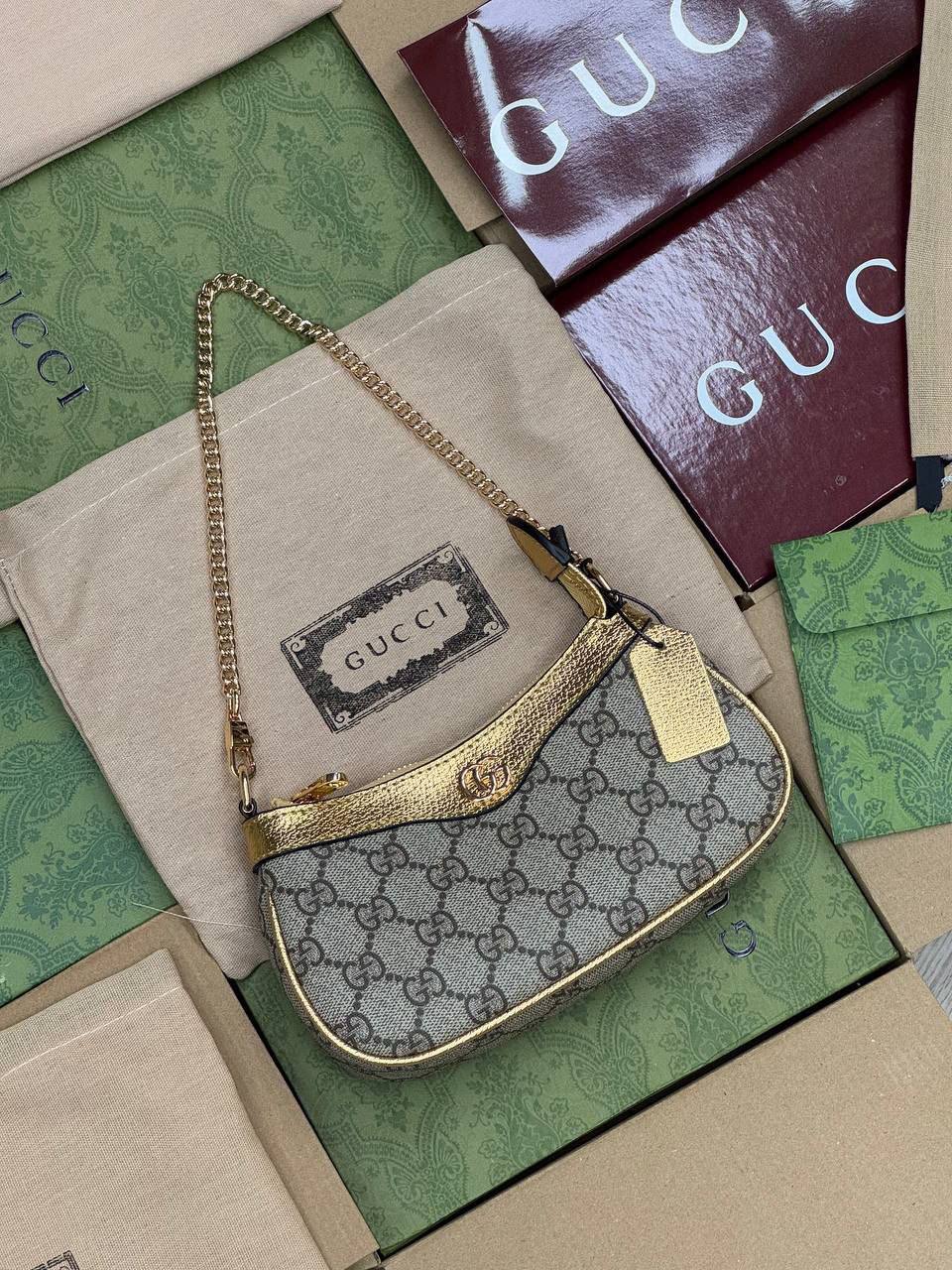 Sac Gucci à détail Doré
