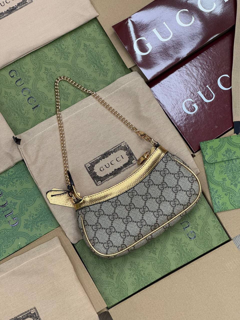 Sac Gucci à détail Doré