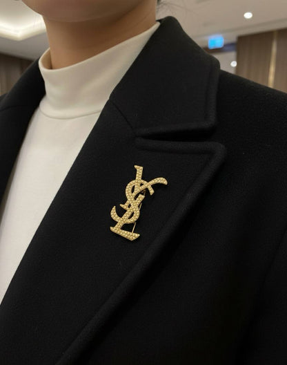 Broche Yves Saint Laurent Inoxydable