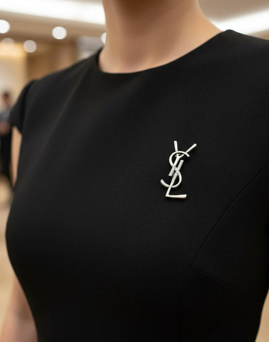 Broche Yves Saint Laurent Inoxydable