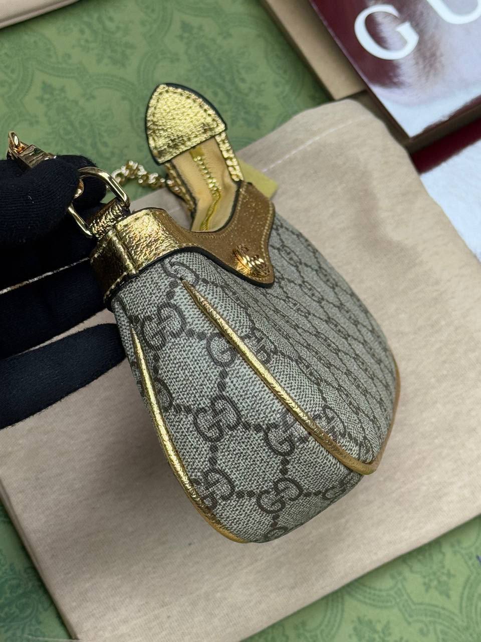 Sac Gucci à détail Doré