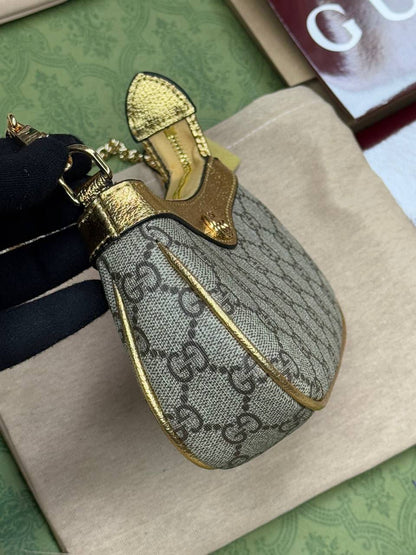 Sac Gucci à détail Doré
