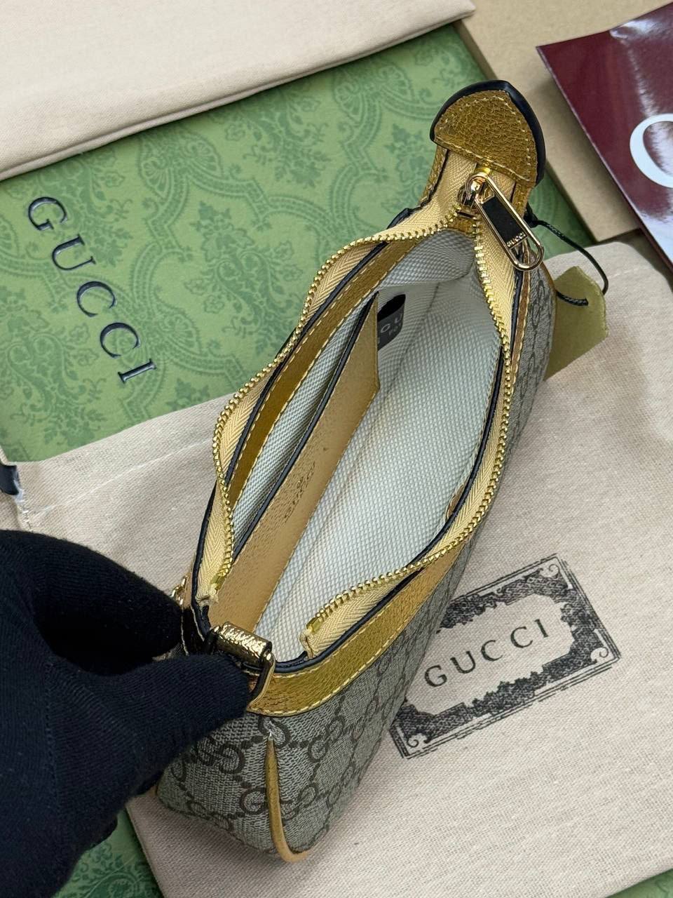 Sac Gucci à détail Doré