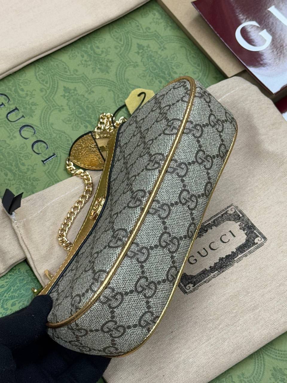 Sac Gucci à détail Doré