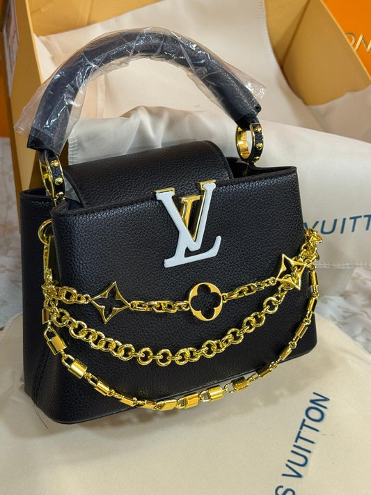 Sac Louis Vuitton A détail Doré