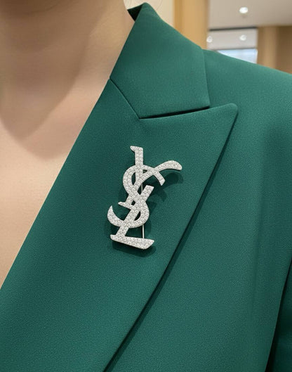 Broche Yves Saint Laurent Inoxydable