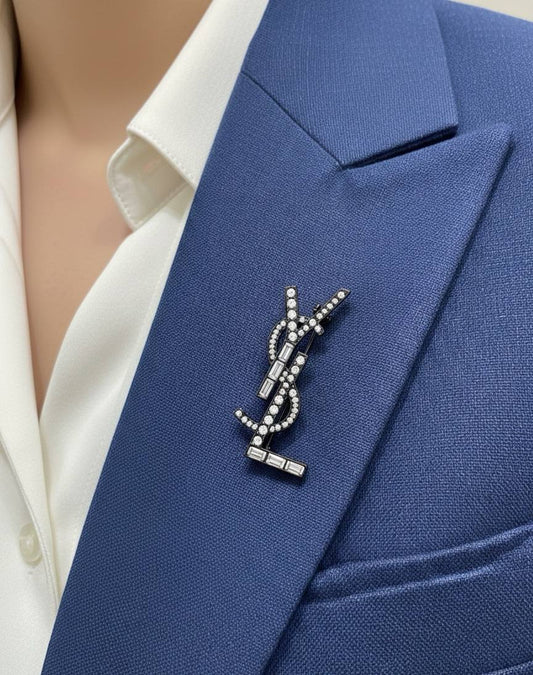 Broche Yves Saint Laurent Inoxydable